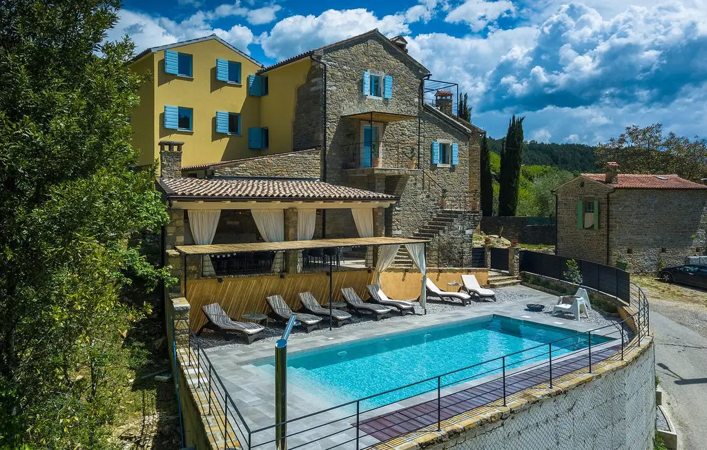 Rustic villa with pool and sun loungers