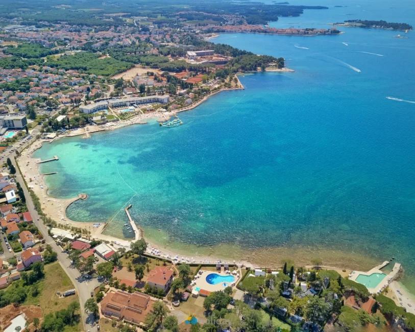 Aerial view of turquoise coastal town and beaches