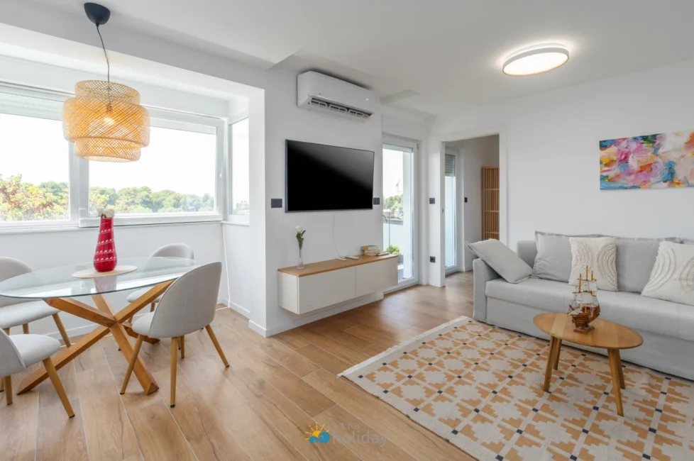 Bright modern living room with dining area