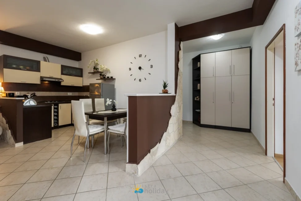 Modern open-plan kitchen and dining area interior