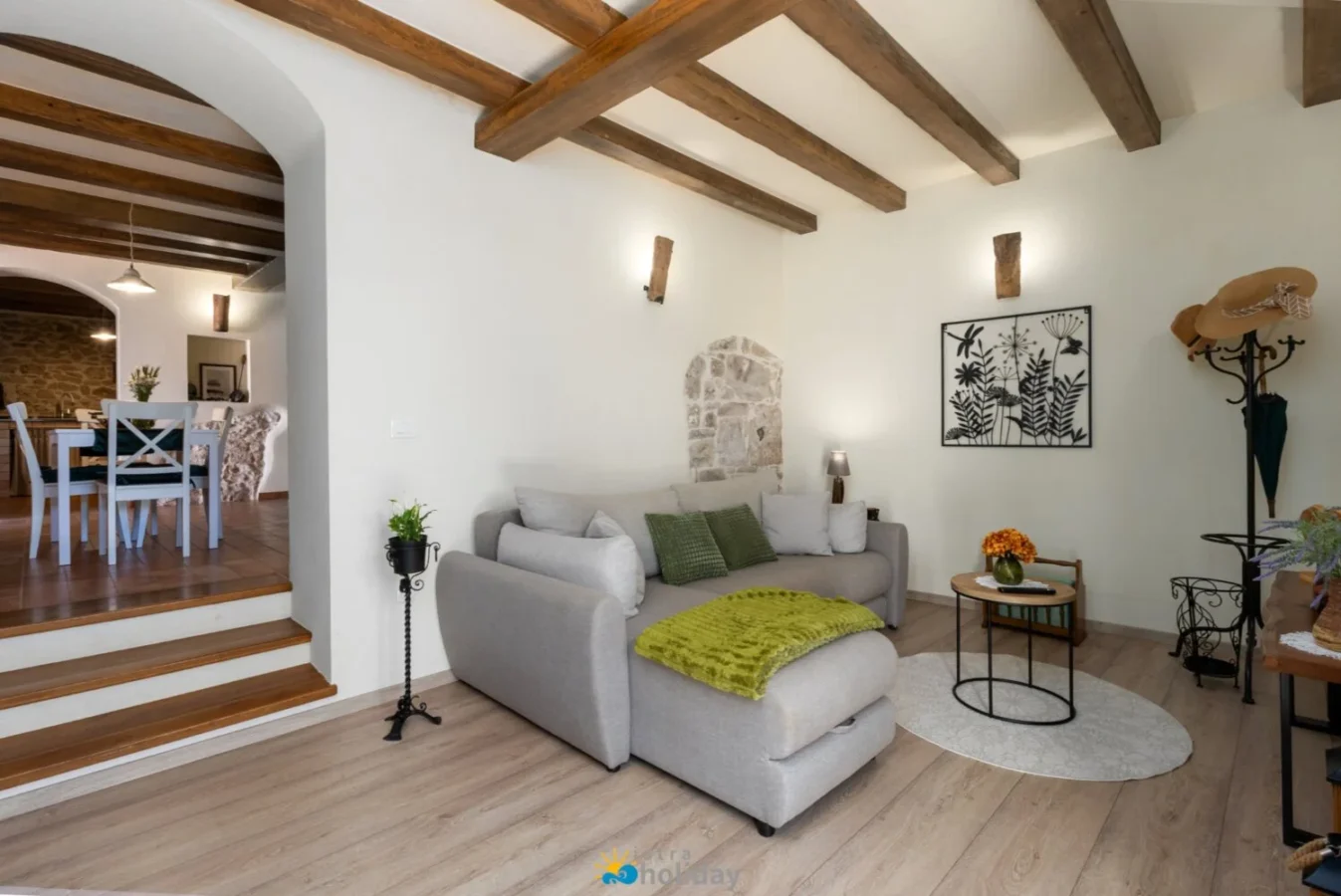 Cozy rustic living room with exposed beams