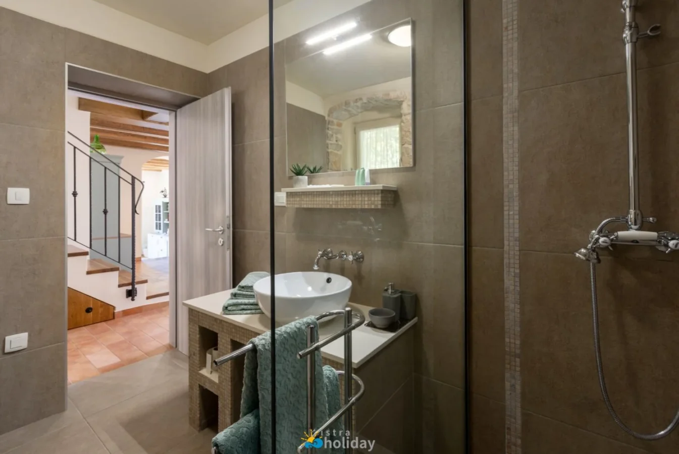 Modern bathroom with walk-in shower and vessel sink