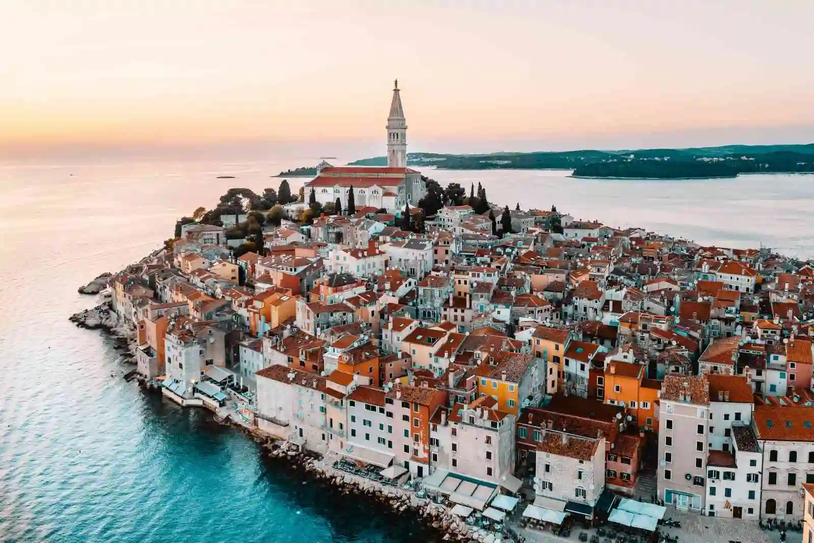 Aerial view of Rovinj coastal town in Croatia at sunset.