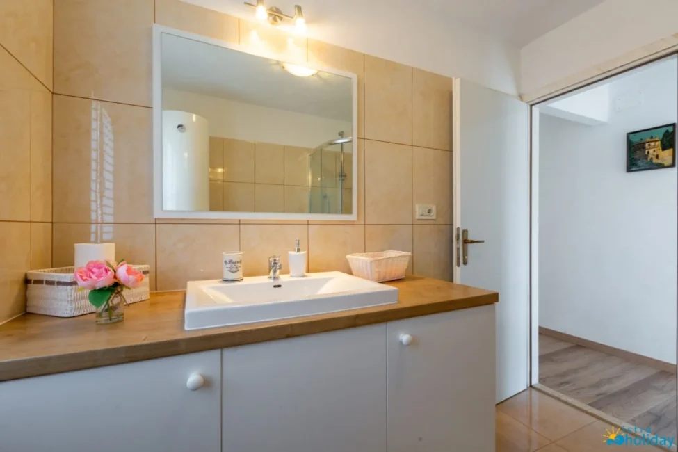 Modern bathroom with sink and mirror